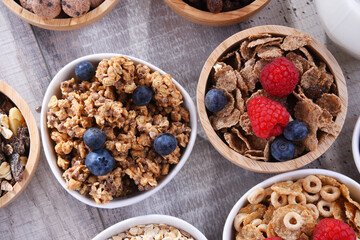 Bowls with different sorts of breakfast cereal products