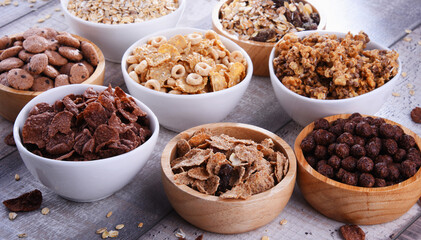 Bowls with different sorts of breakfast cereal products