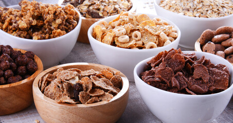 Bowls with different sorts of breakfast cereal products