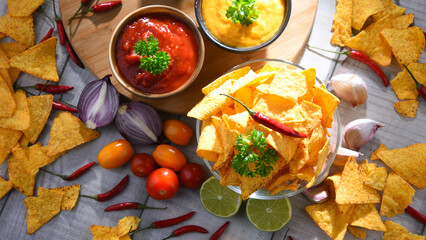 Composition with bowl of potato chips.