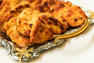 Delicious golden brown Wiener schnitzel prepared from veal slices. Viennese-style schnitzel.