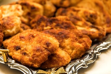 Delicious golden brown Wiener schnitzel prepared from veal slices. Viennese-style schnitzel.
