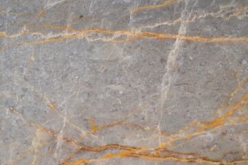 background texture of gray marble tiles with orange stripes.