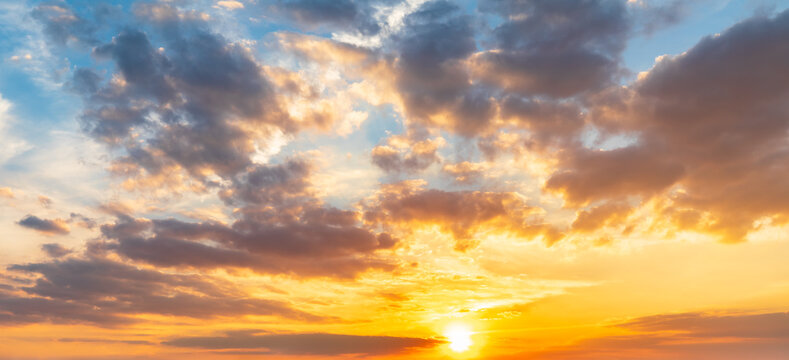 Yellow sky sunset clouds nature background.