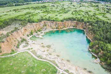 Fototapeta na wymiar Old quarry, turquoise water