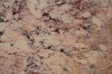 background texture of gray marble tiles with dark red spots.