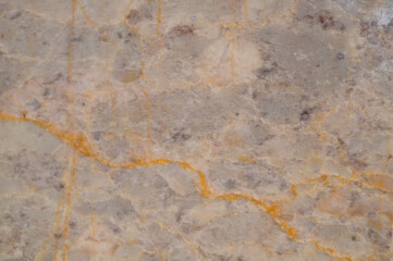 background texture of gray marble tiles with orange stripes.