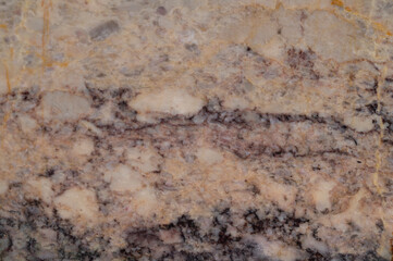 background texture of gray marble tiles with dark red spots.