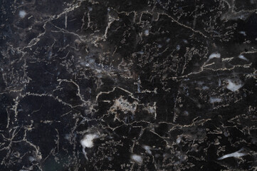 background texture of black marble tiles.