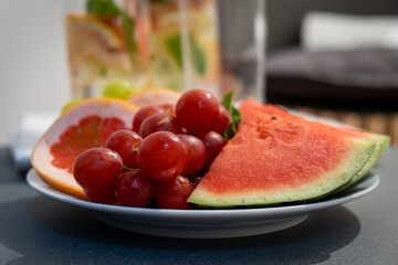 Closeup of grapes and a watermelon on a plate