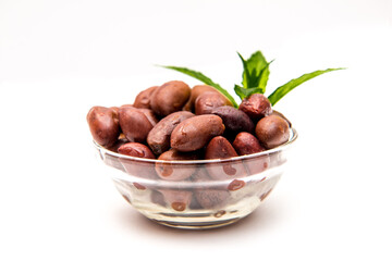 Kalamata olives with mint leaves on a white background