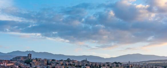 Panoramic of the city of &Aacute;vila at sunset with the Sierra de La Paramera in the background
