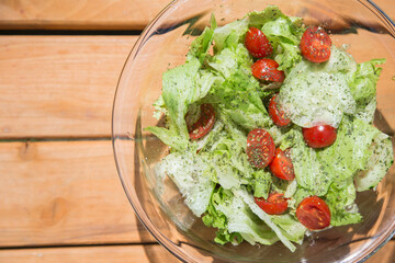 Plat of salad on a sunny day