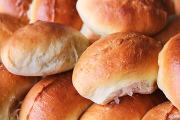 Freshly baked pasties with filling. Close-up. Background. Texture.