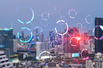 Cityscape of Bangkok city and technology drawing hud multiexposure. Sunset.