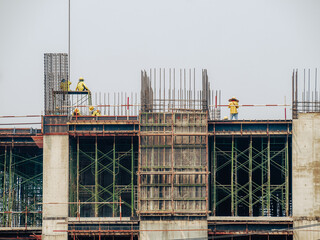 Construction man workers working at construction site