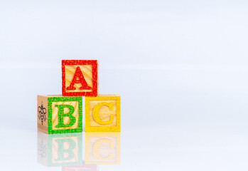 abc wooden cube with educational concept.