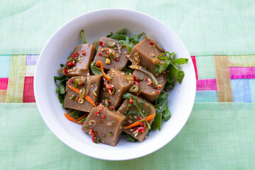 Seasoned Acorn Jelly Salad which is called Muk made of buckwheat