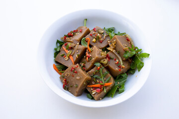 Seasoned Acorn Jelly Salad which is called Muk made of buckwheat