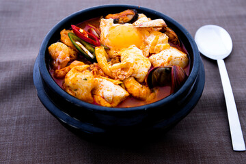 Korean spicy silken tofu stew with seafood