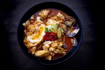 Korean spicy silken tofu stew with seafood