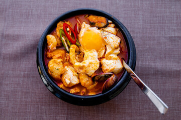 Korean spicy silken tofu stew with seafood