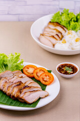 Grilled pork salad on wooden table