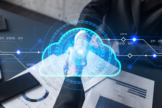 Multiexposure of two businesspeople handshake and data cloud icon hologram drawing background. Concept of store information. Formal wear.