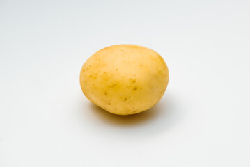 Fresh potatoes on white background