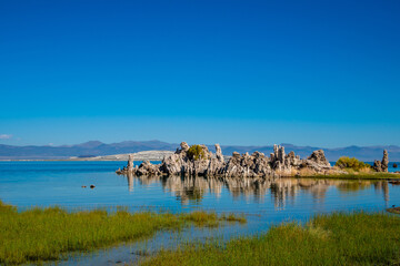 Fototapeta na wymiar View of Mono Lake with tufa formations reflected in the water , California, USA