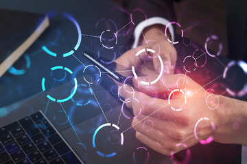 Businessman using app on phone. Abstract technology icons hologram. Multiexposure. People connection concept.