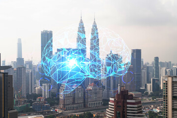 Brain hologram over panorama city view of Kuala Lumpur. KL is the largest science hub in Malaysia,...