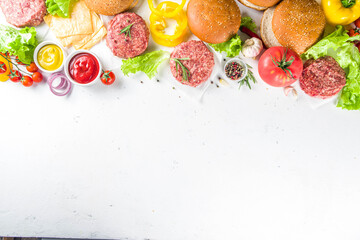 Cooking burger background. Set various cheeseburger  and beefburger ingredients - bun, tomatoes,...