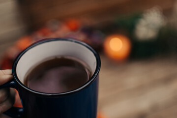 Flat lay winter cozy Christmas vintage background with. The cup of tea or coffee. Christmas atmosphere.
