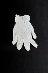 Medical glove on a black background