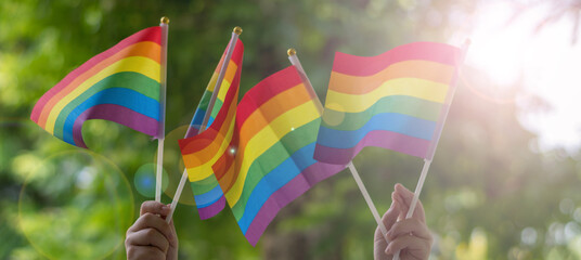 LGBT, pride, rainbow flag as a symbol of lesbian, gay, bisexual, transgender, and queer pride and LGBTQ social movements in June month