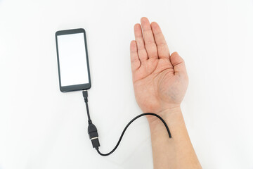 Augmented human hand connected to a smartphone via usb cable and transferring data. Hologram...