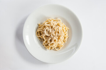 Tonnarelli cacio e pepe is a typical Lazio specialty in Italy spaghetti with pecorino cheese and...