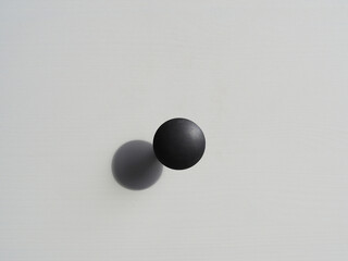 black handle of a wooden chest painted with white paint. minimalism, interior