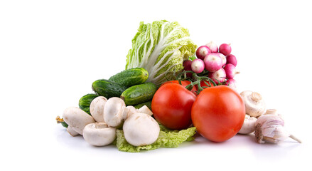 vegetables tomatoes, lettuce, radishes, mushrooms champignon , cucumbers, garlic on a white isolated background