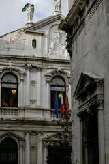 Fototapeta na wymiar vertical photo of the balcony of an old building in Venice