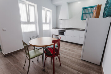 Kitchen inside a modern style rental house.