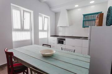 Kitchen inside a modern style rental house.