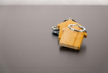 home wooden key chains on table
