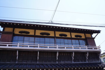 Japanese old style Architecture with yellow wall and big windows at Kamakura, Japan. A Taisenkaku, Japanese inn. Kamakura Important structure.