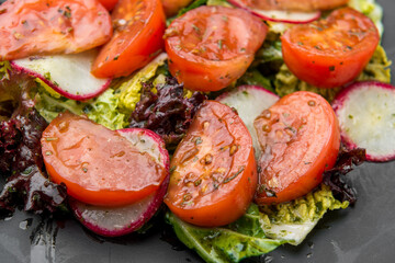 tomato salad with basil, black pepper and garlic