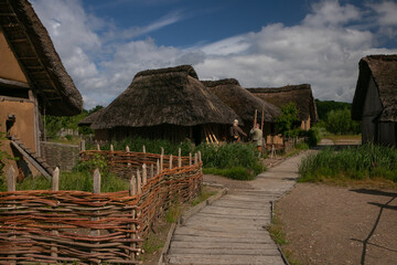 reconstructed  thatched viking houses at the ancient viking city of Hedeby