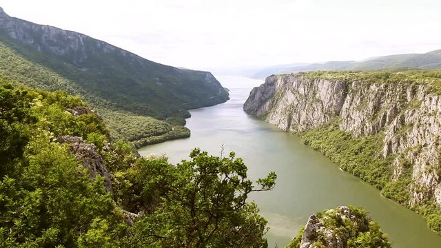  Danube river summer landscape. Gorge on the Danube between Serbia and Romania, also known as the Iron Gate.