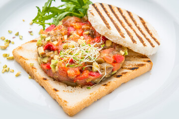 Bruschetta with tomato, mozarella and basil