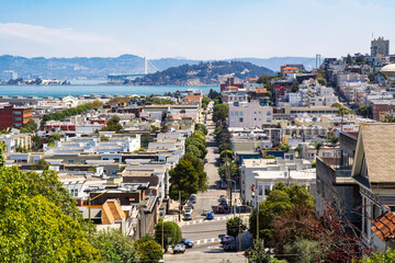 View towards San Francisco Bay, Russian Hill and North Beach of San Francisco from Russian Hill showing the hilly terrain in a sunny day